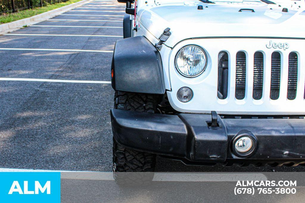 used 2016 Jeep Wrangler Unlimited car, priced at $18,420