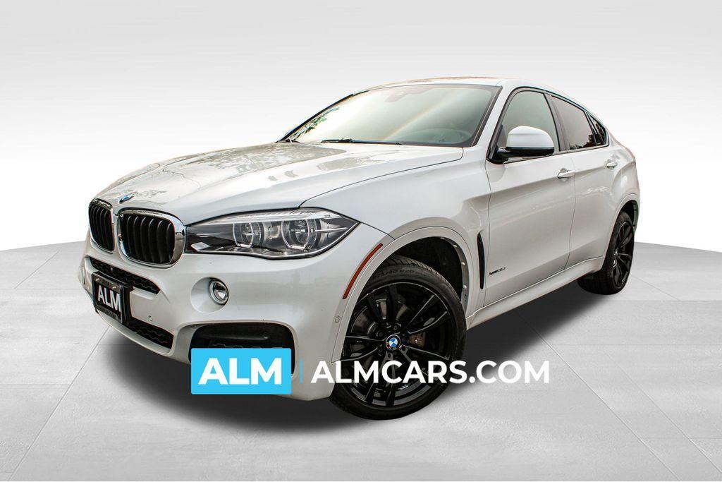 used 2019 BMW X6 car, priced at $33,970