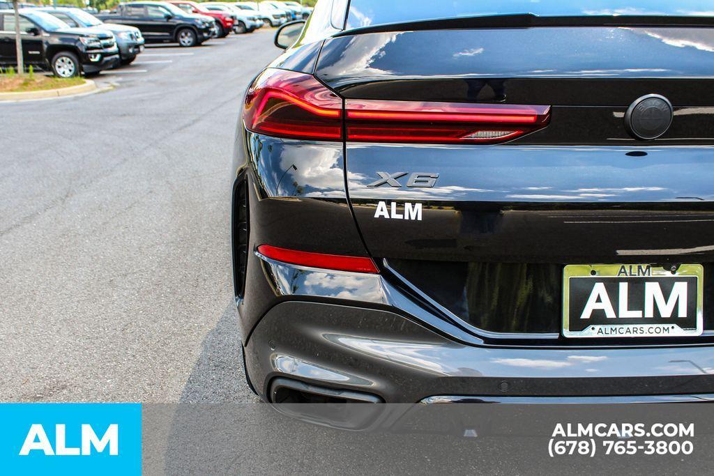 used 2022 BMW X6 car, priced at $52,420