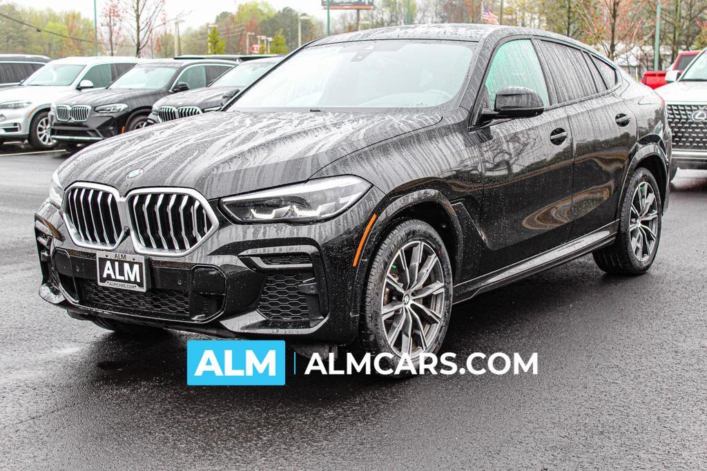 used 2023 BMW X6 car, priced at $58,420