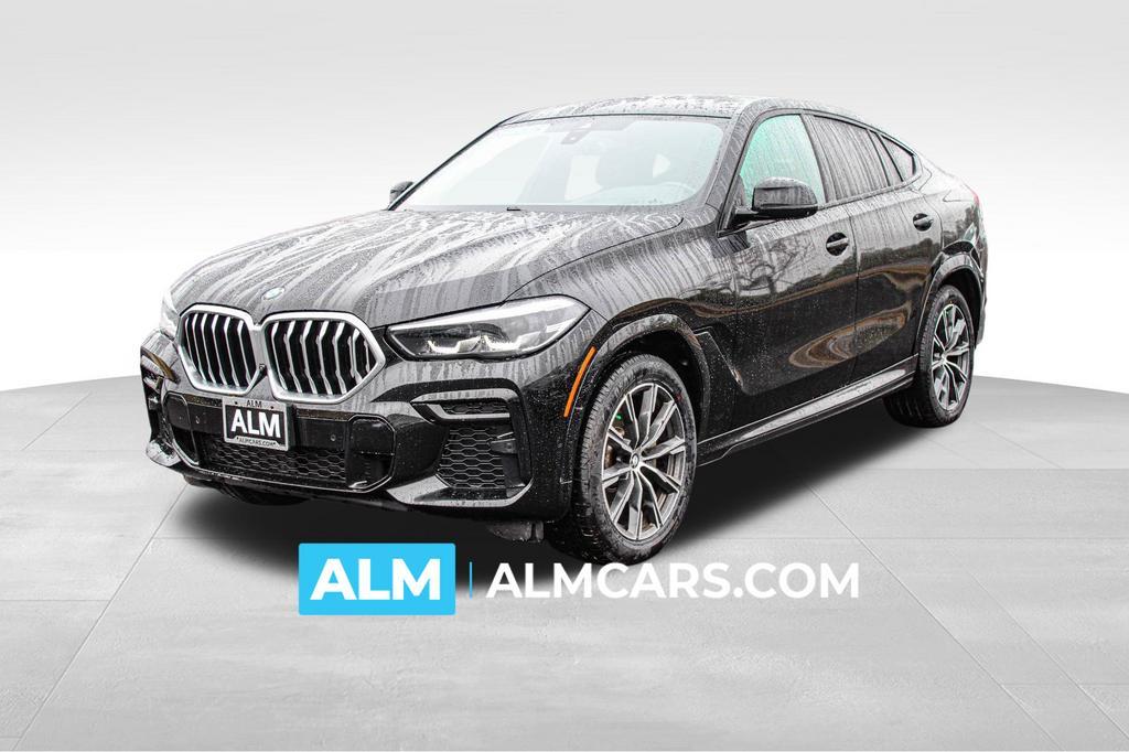 used 2023 BMW X6 car, priced at $57,420
