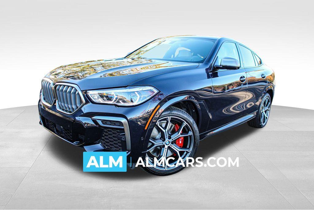 used 2022 BMW X6 car, priced at $57,920