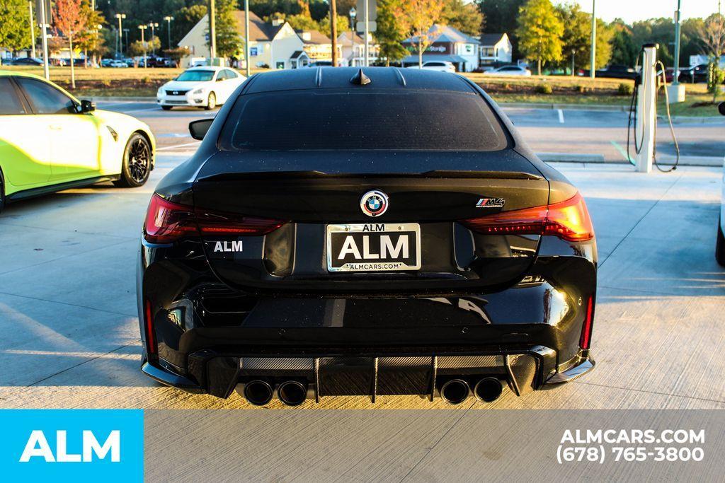 used 2023 BMW M4 car, priced at $71,420