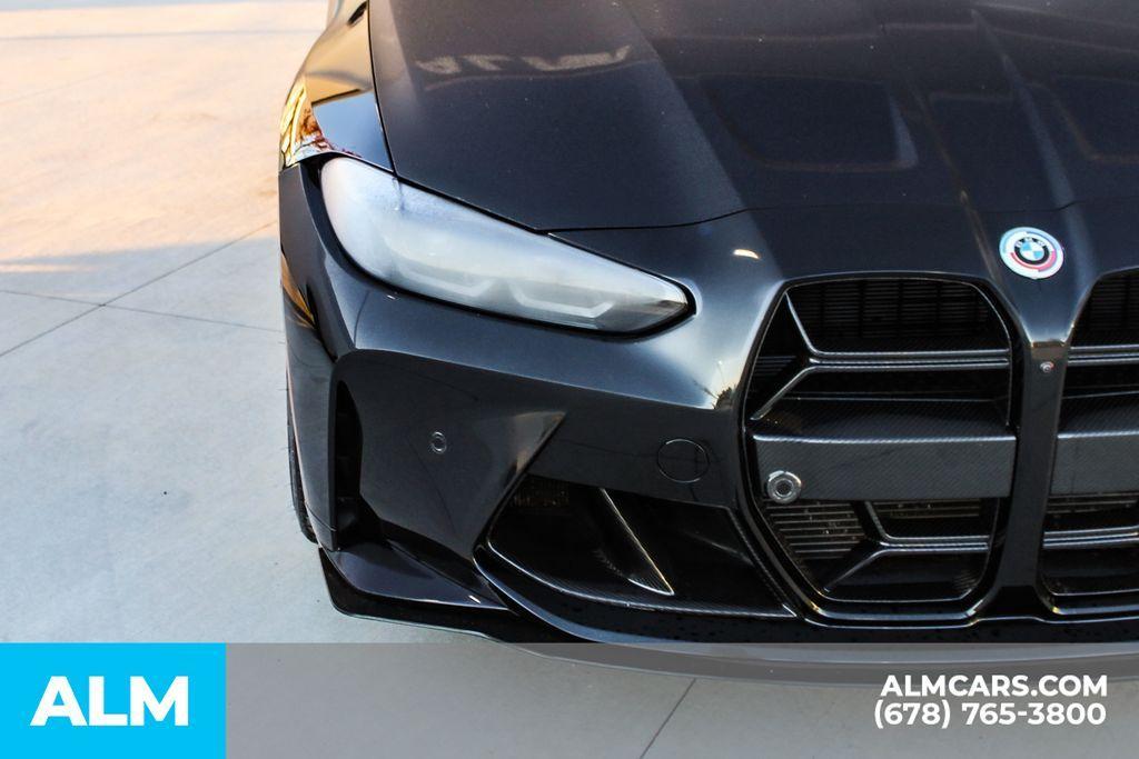 used 2023 BMW M4 car, priced at $71,420