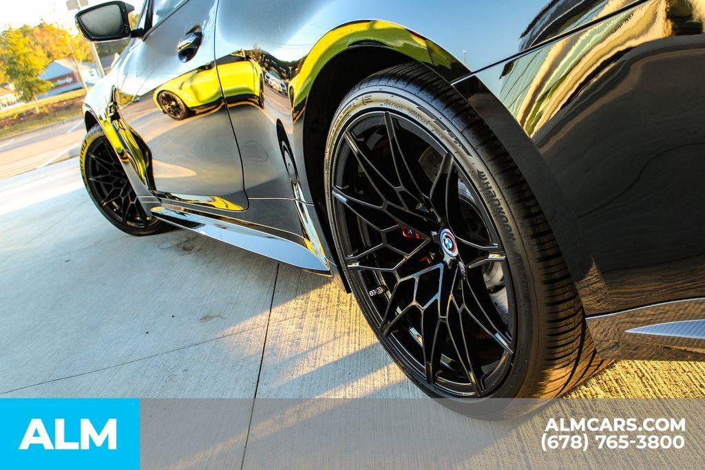 used 2023 BMW M4 car, priced at $71,420