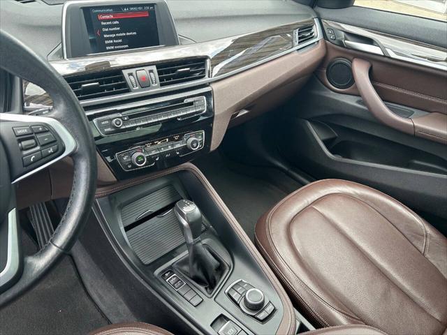 used 2018 BMW X1 car, priced at $17,395