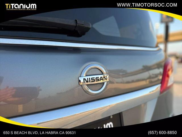 used 2015 Nissan Quest car, priced at $6,990