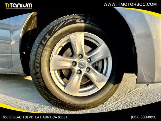 used 2015 Nissan Quest car, priced at $6,990