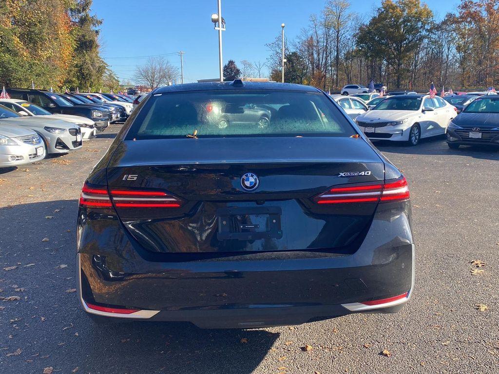 used 2025 BMW i5 car, priced at $59,995