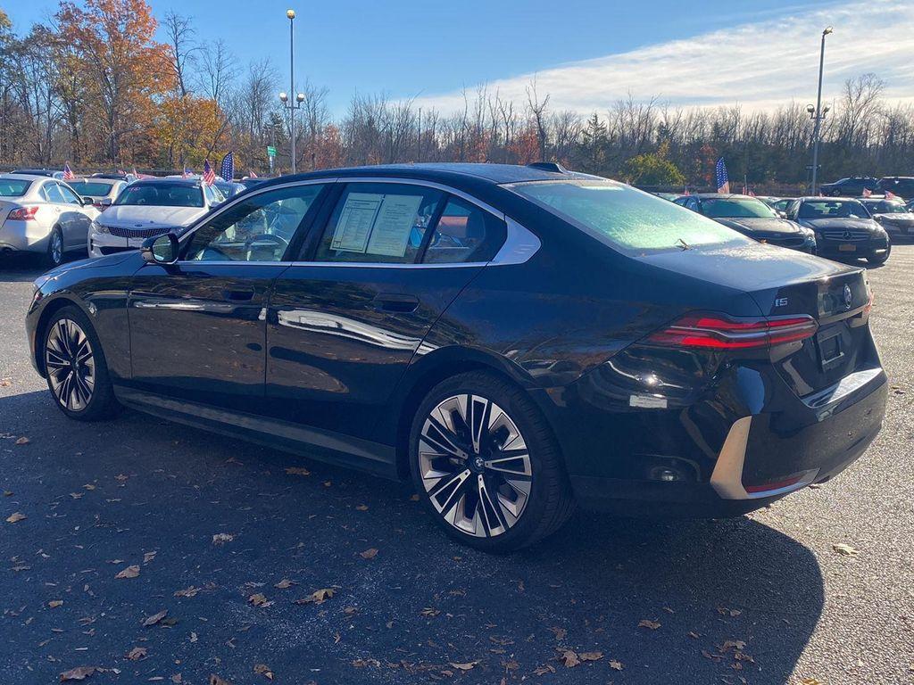 used 2025 BMW i5 car, priced at $59,995