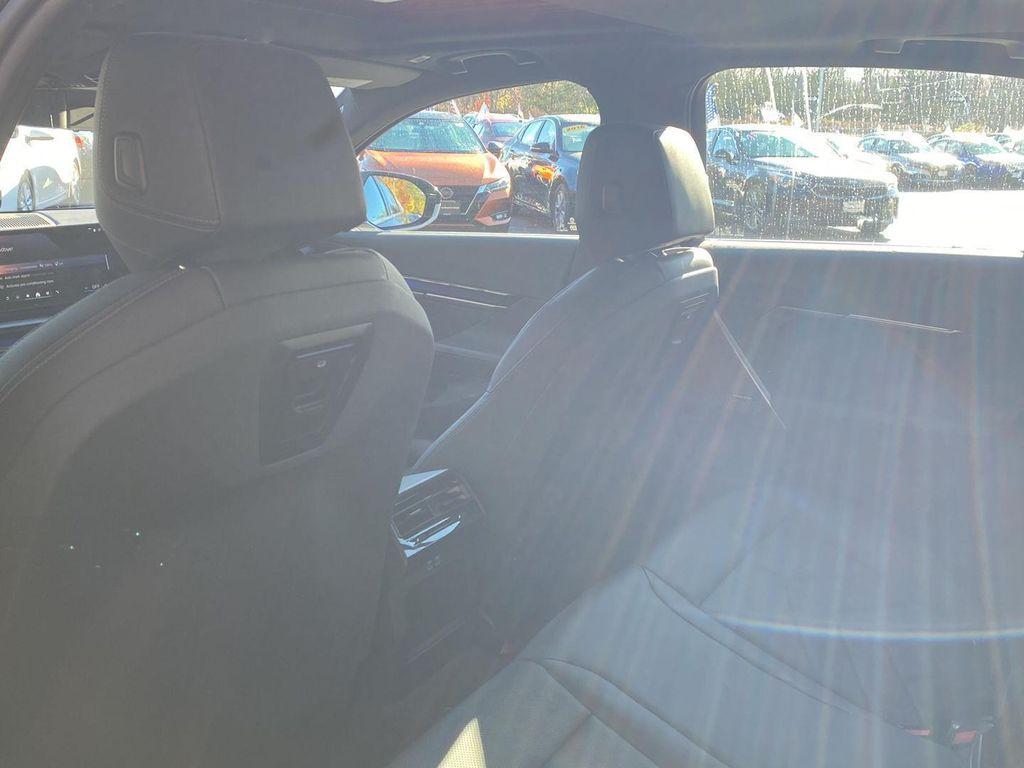 used 2025 BMW i5 car, priced at $59,995