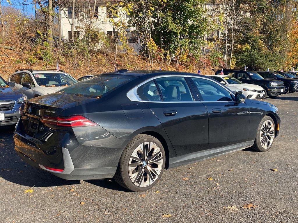used 2025 BMW i5 car, priced at $59,995