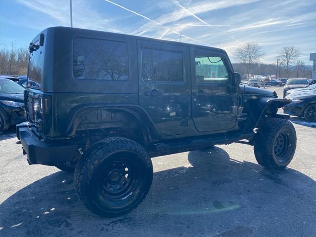 used 2010 Jeep Wrangler Unlimited car, priced at $12,495