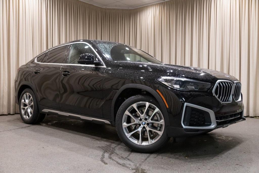 used 2023 BMW X6 car, priced at $56,185