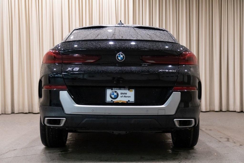 used 2023 BMW X6 car, priced at $56,185
