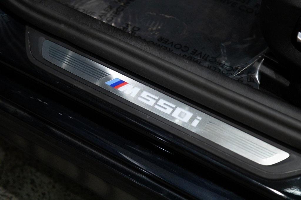 used 2023 BMW M550 car, priced at $63,686