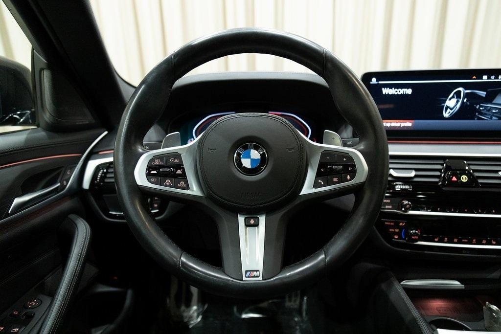 used 2023 BMW M550 car, priced at $63,686