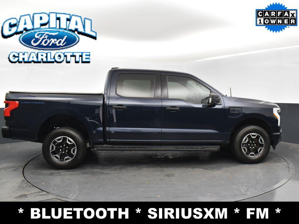 used 2023 Ford F-150 Lightning car, priced at $33,999