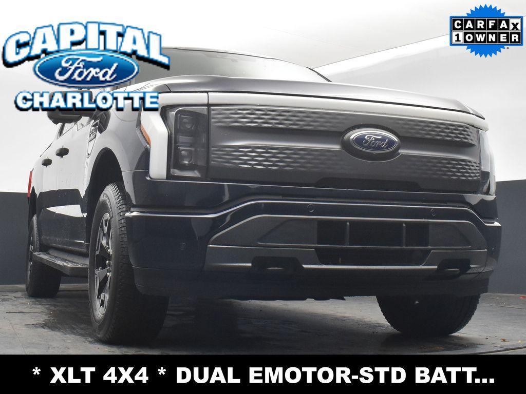 used 2023 Ford F-150 Lightning car, priced at $33,999