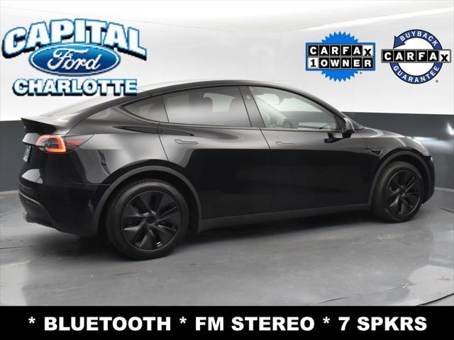 used 2025 Tesla Model Y car, priced at $34,999