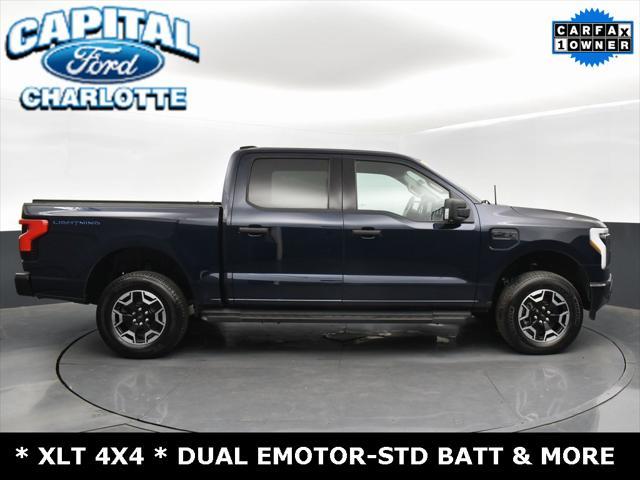 used 2023 Ford F-150 Lightning car, priced at $35,999