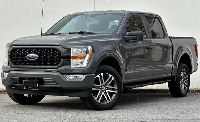 used 2021 Ford F-150 car, priced at $29,999