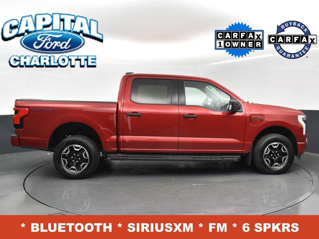 used 2023 Ford F-150 Lightning car, priced at $33,999