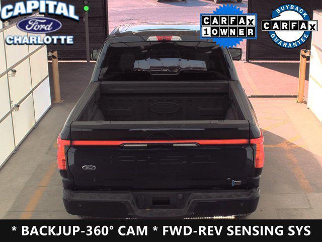 used 2023 Ford F-150 Lightning car, priced at $58,999