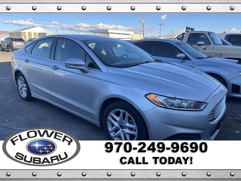 used 2016 Ford Fusion car, priced at $14,596