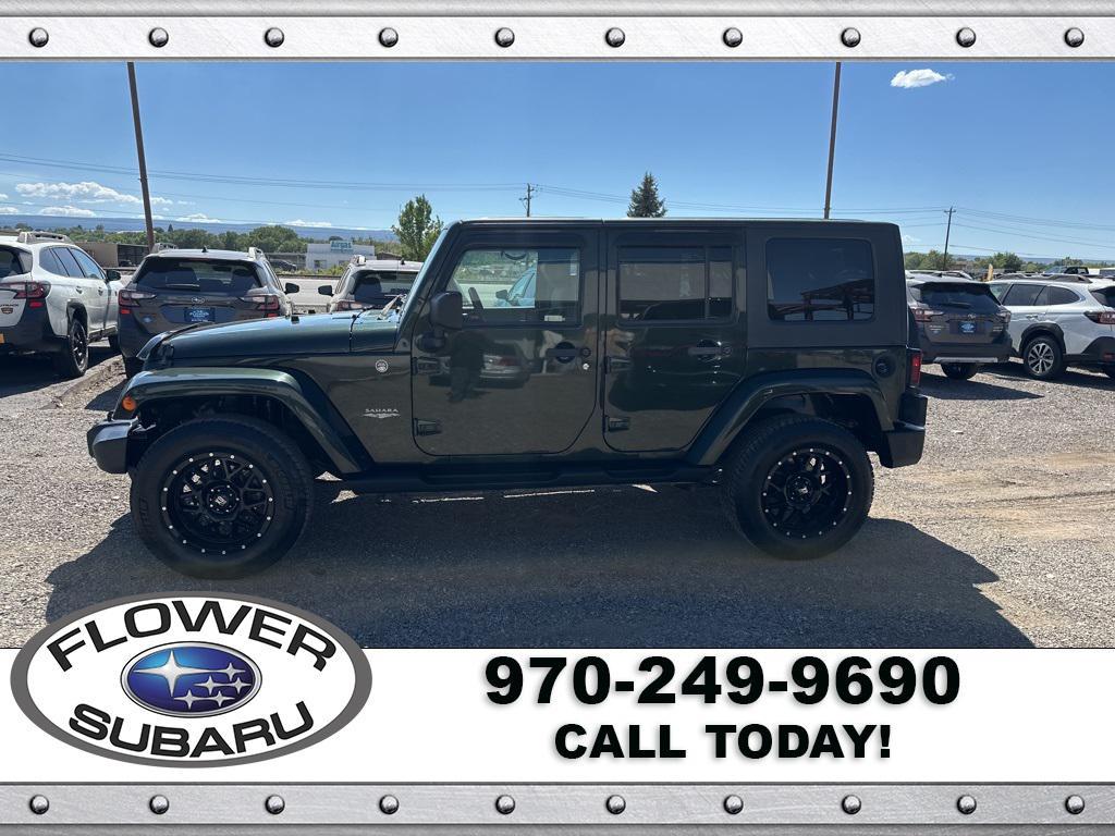 used 2010 Jeep Wrangler Unlimited car, priced at $13,096