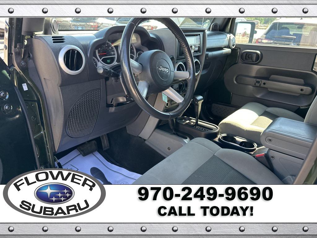 used 2010 Jeep Wrangler Unlimited car, priced at $13,096
