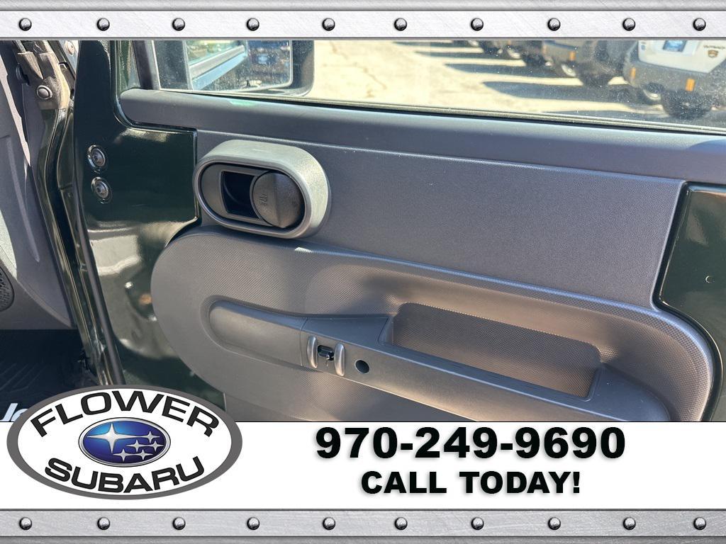 used 2010 Jeep Wrangler Unlimited car, priced at $13,096