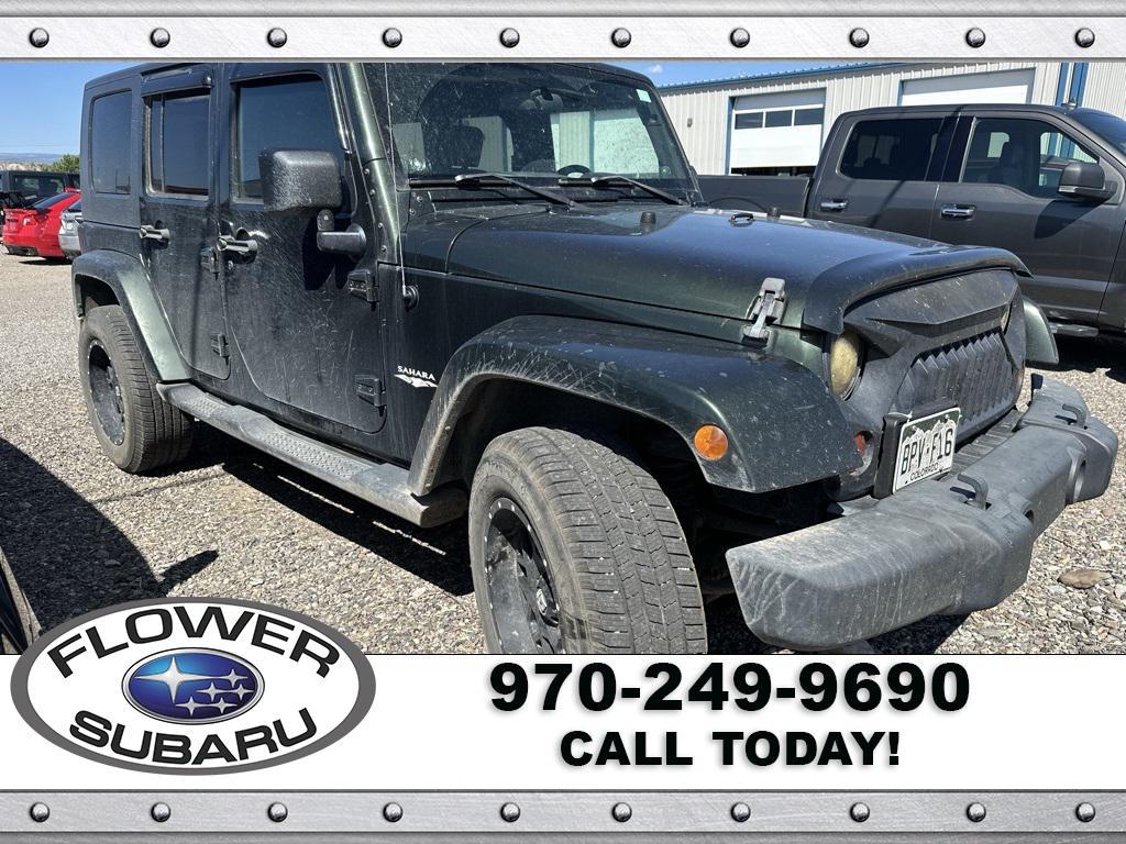 used 2010 Jeep Wrangler Unlimited car, priced at $15,596