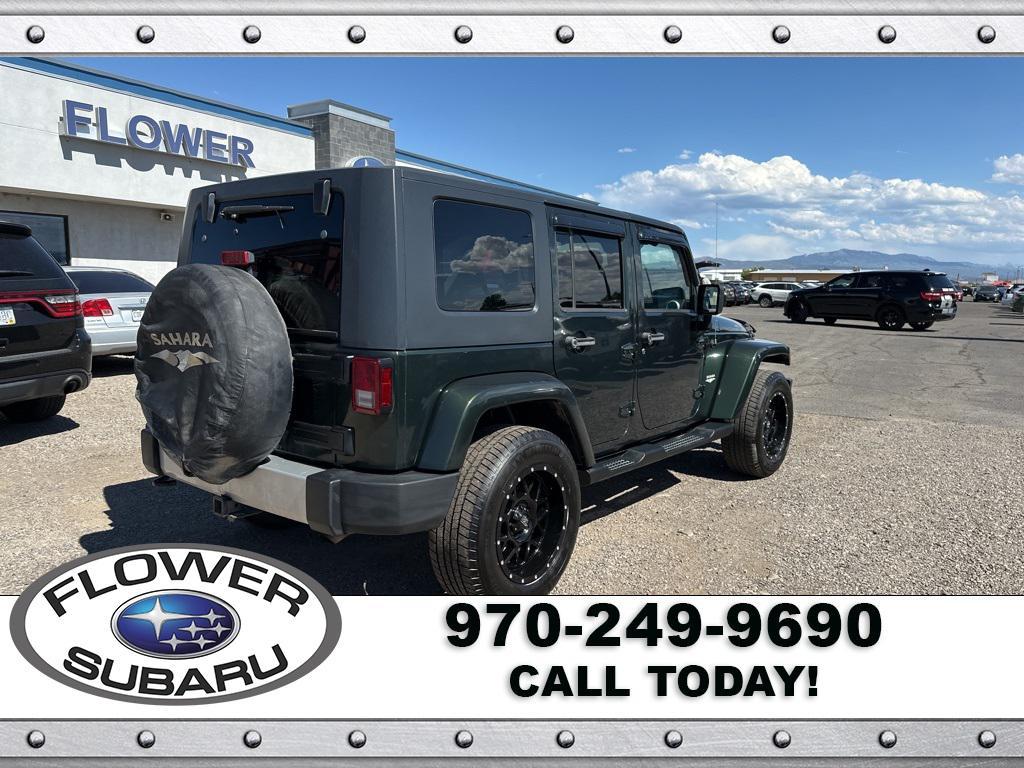 used 2010 Jeep Wrangler Unlimited car, priced at $13,096