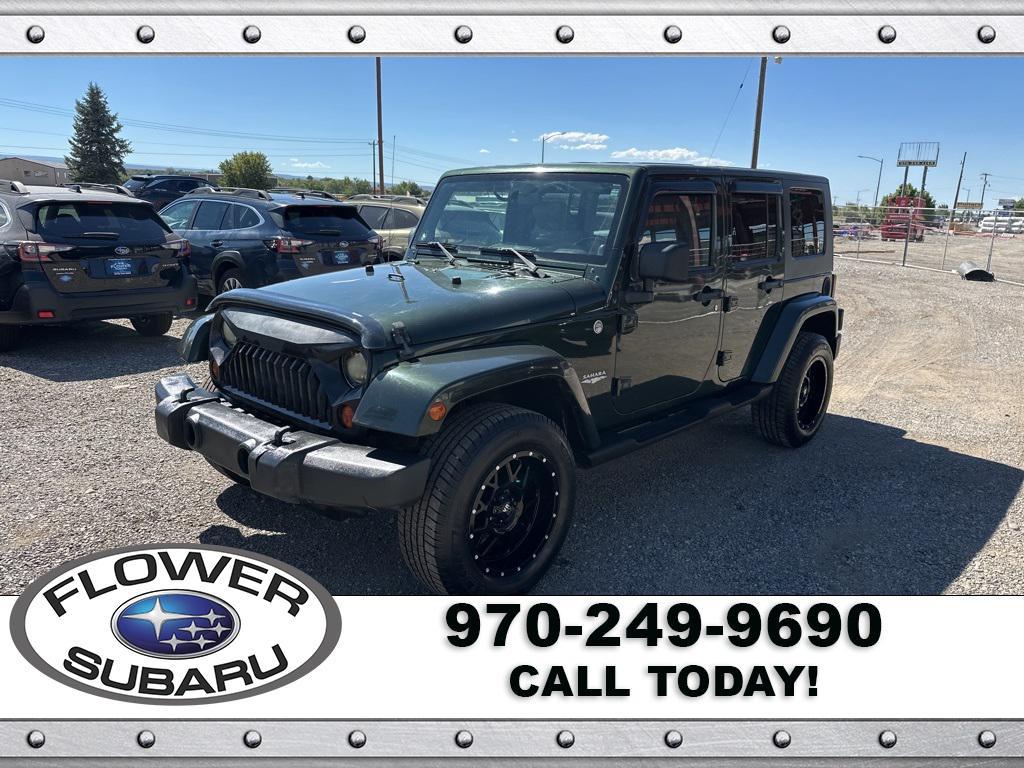 used 2010 Jeep Wrangler Unlimited car, priced at $13,096