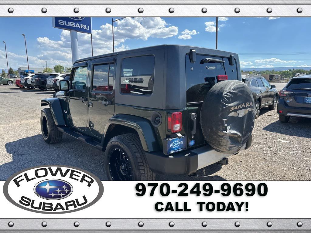 used 2010 Jeep Wrangler Unlimited car, priced at $13,096