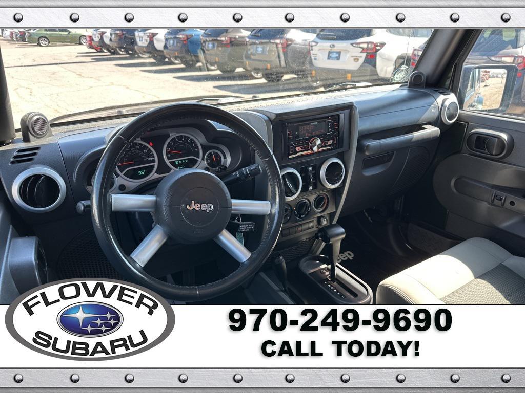 used 2010 Jeep Wrangler Unlimited car, priced at $13,096