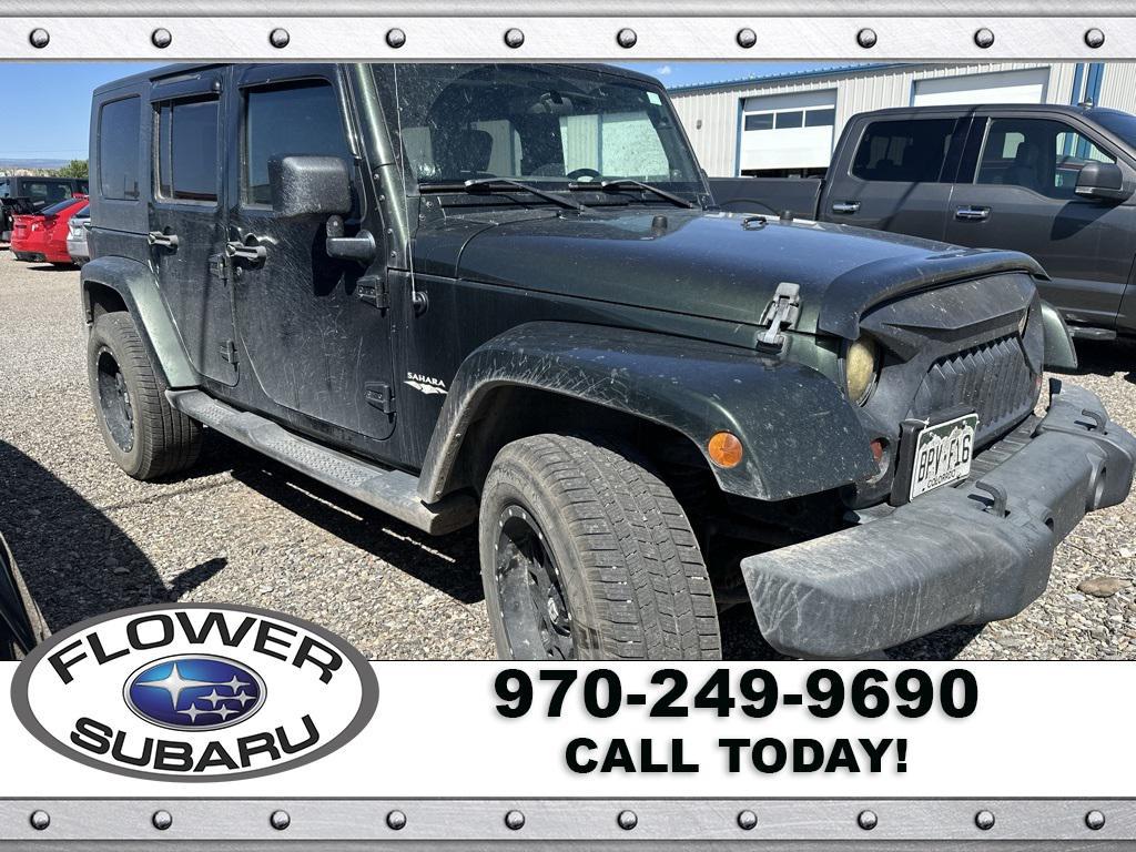 used 2010 Jeep Wrangler Unlimited car, priced at $15,596