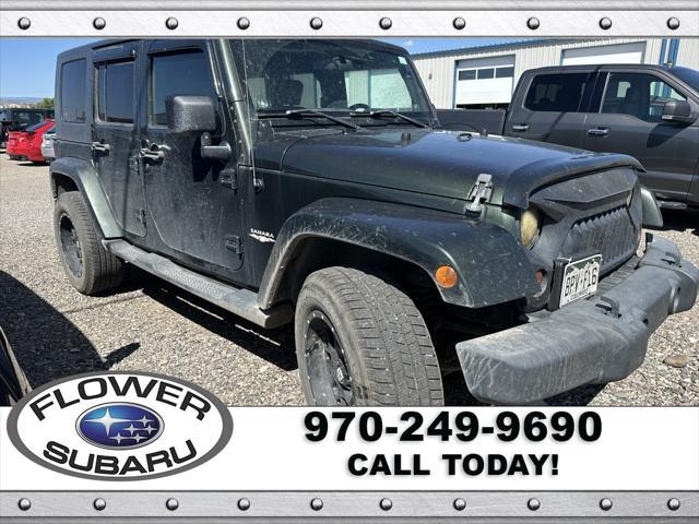 used 2010 Jeep Wrangler Unlimited car, priced at $15,596