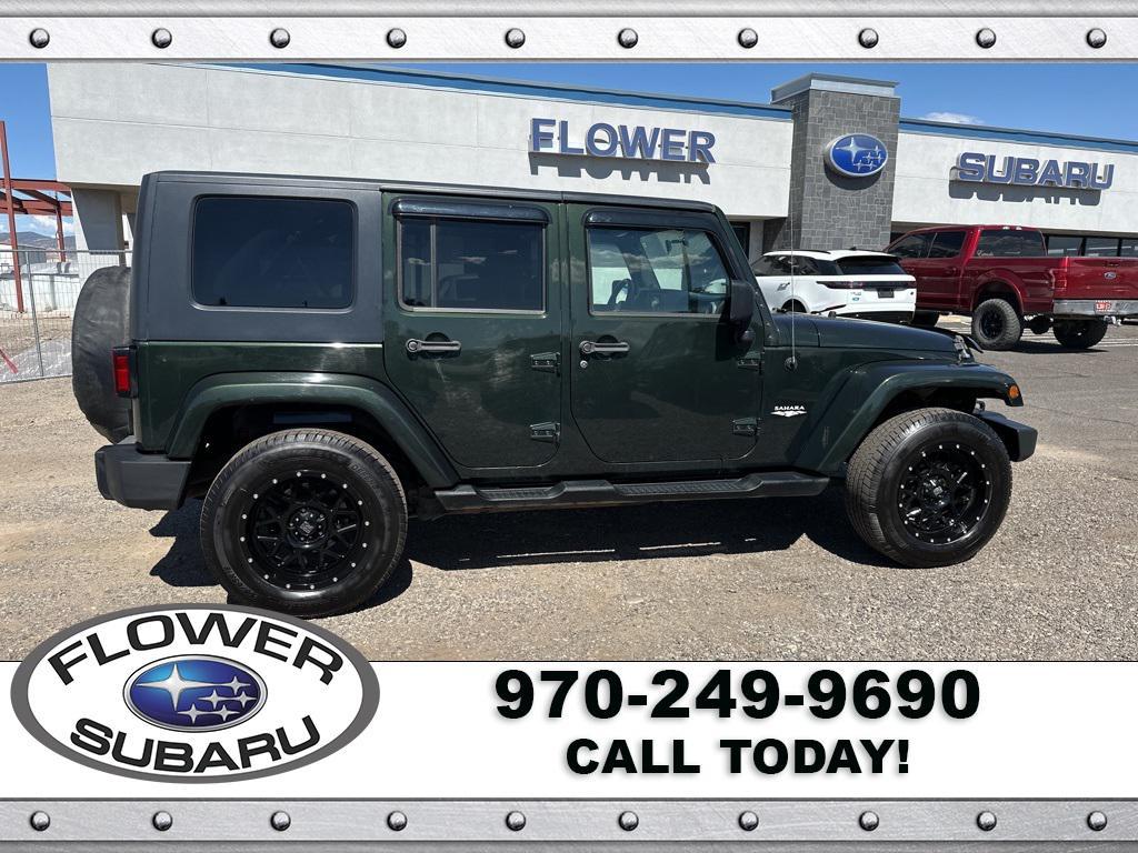 used 2010 Jeep Wrangler Unlimited car, priced at $13,096