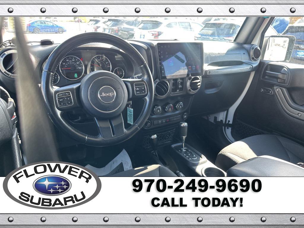 used 2016 Jeep Wrangler Unlimited car, priced at $19,596