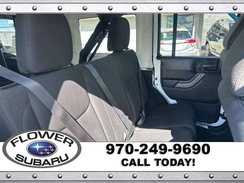 used 2016 Jeep Wrangler Unlimited car, priced at $19,596