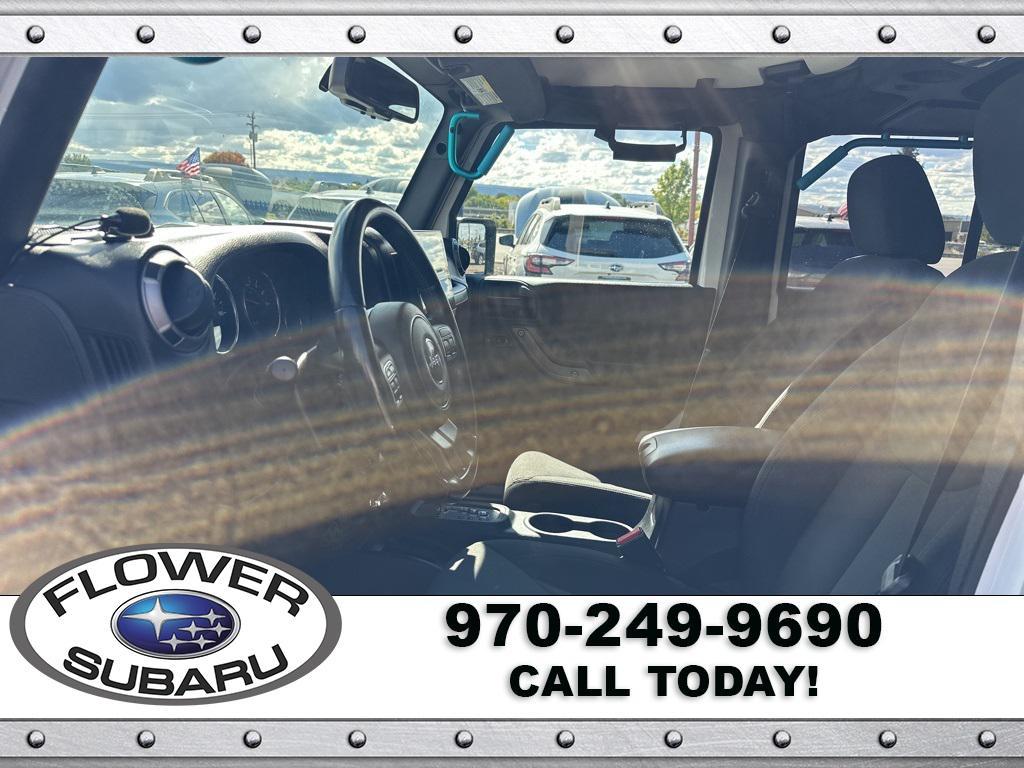 used 2016 Jeep Wrangler Unlimited car, priced at $19,596