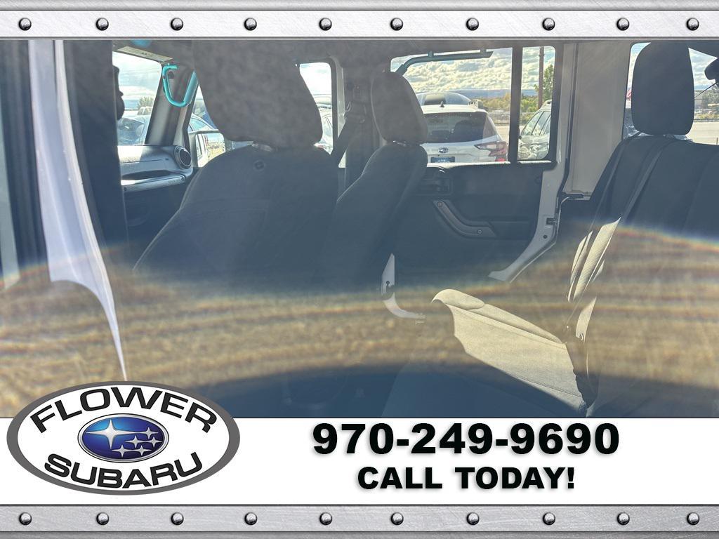 used 2016 Jeep Wrangler Unlimited car, priced at $19,596