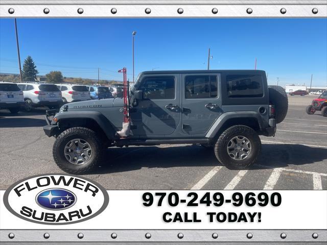 used 2015 Jeep Wrangler Unlimited car, priced at $27,596