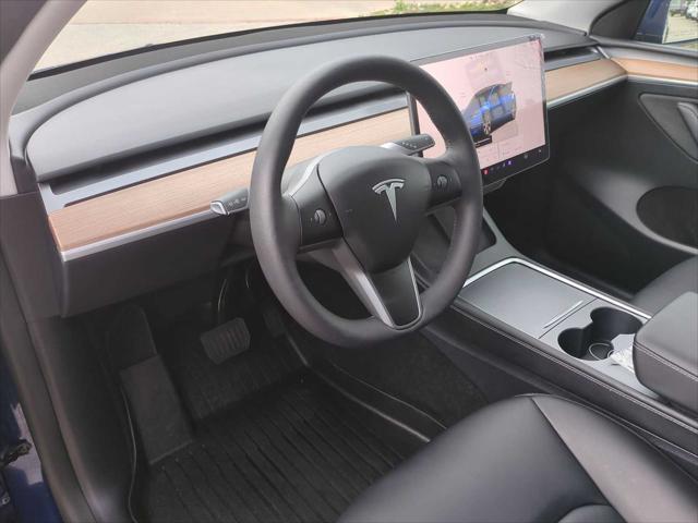 used 2024 Tesla Model Y car, priced at $32,495