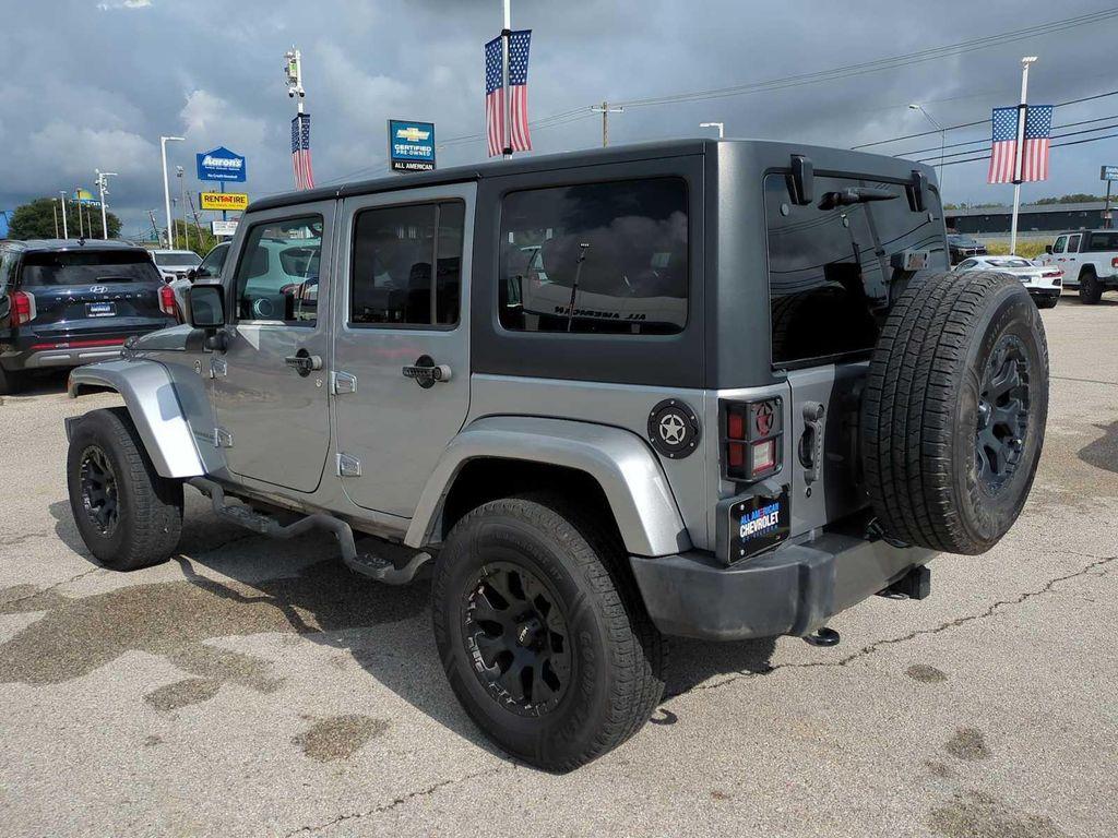 used 2015 Jeep Wrangler Unlimited car, priced at $16,753