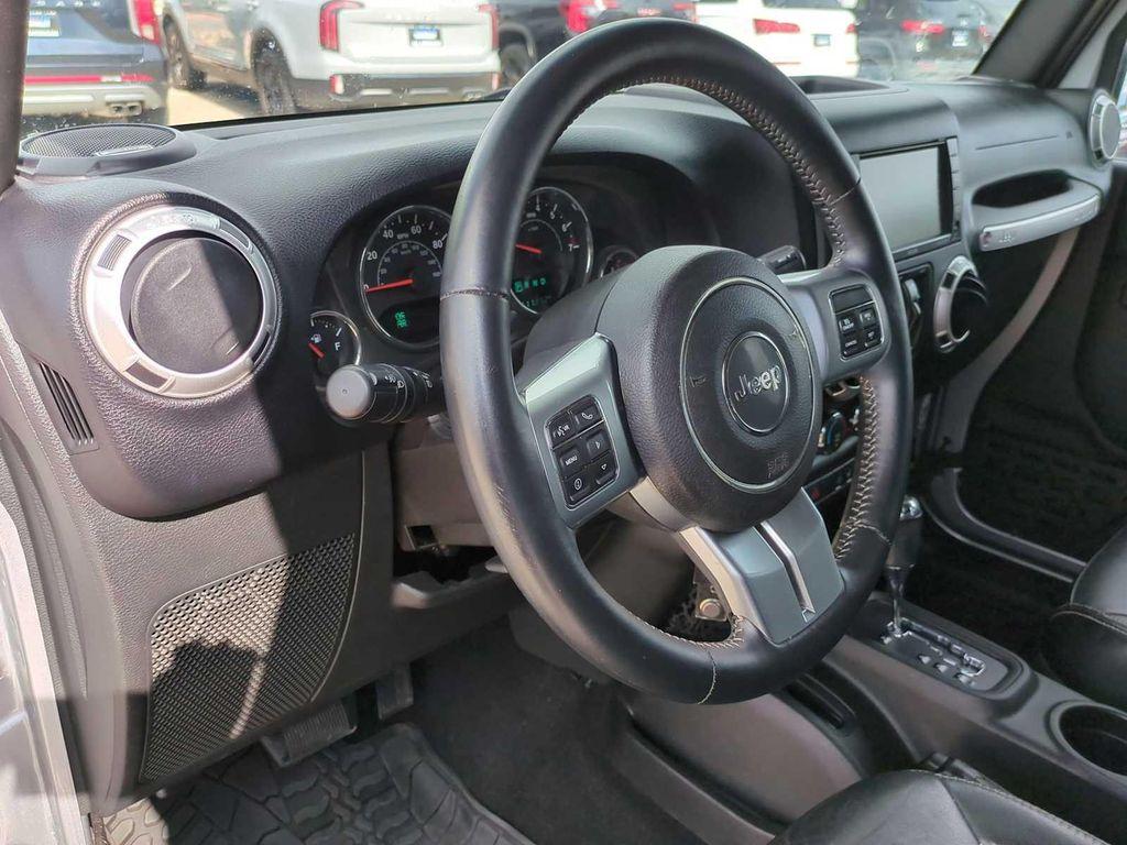 used 2015 Jeep Wrangler Unlimited car, priced at $16,753