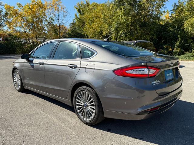 used 2014 Ford Fusion Hybrid car, priced at $10,000