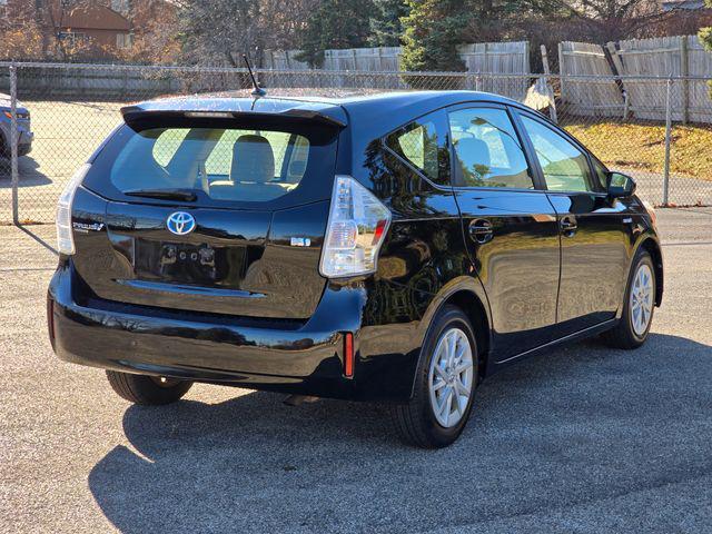 used 2014 Toyota Prius v car, priced at $11,000